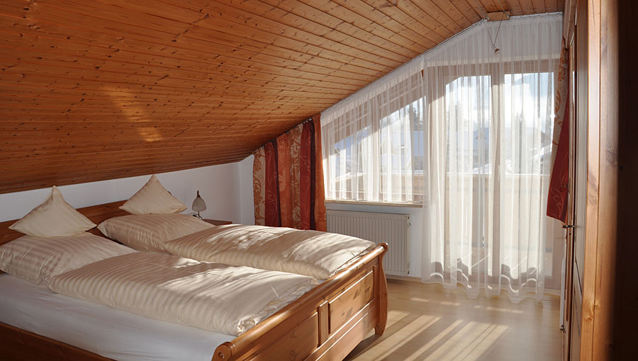 Schlafzimmer - Ferienwohnung Alpenblick